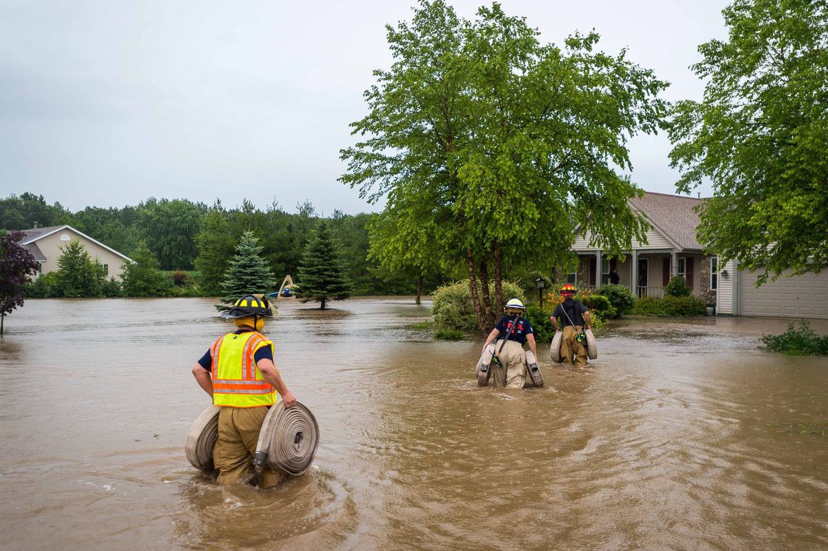 Rochester firefighters assisting in flooding conditions